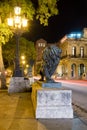 Night scene in Old Havana with a famous bronze lion considered a symbol of the city