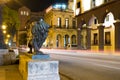 Night scene in Old Havana with a famous bronze lion considered a symbol of the city