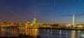 Night scene of Omaha waterfront with light reflections on the r Omaha Nebraska skyline with beautiful sky colors just after sunset