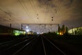 Night scene of rails and train in Carpati station, Bucharest, CFR Royalty Free Stock Photo