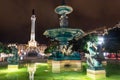 Night scene of Rossio Square, Lisbon, Portugal with one of its decorative fountains and the Column of Pedro IV Royalty Free Stock Photo