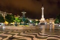 Night scene of Rossio Square, Lisbon, Portugal with one of its decorative fountains and the Column of Pedro IV Royalty Free Stock Photo