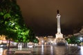 Night scene of Rossio Square, Lisbon, Portugal with one of its decorative fountains and the Column of Pedro IV Royalty Free Stock Photo