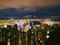 A night scene of the sea and Victorian Harbour from the Peak in Hong Kong Royalty Free Stock Photo