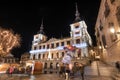 Night scene of Toledo town hall in christmas time, unrecognizable people is in the scene, Toledo, Spain