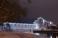 Night scene of Trinity hill, downtown Nemiga, Nyamiha, Belarus. Minsk city nightly landscape with reflection in Svislach river in