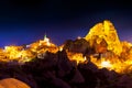 Night scene of the Uchisar Castle in Cappadocia. Illuminated vie