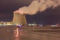 Night scene with view on riverbank with nuclear reactor Doel, Port of Antwerp, Belgium