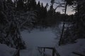 Night scene in winter, starry sky and frozen river Valge, Estonian nature