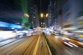 Night scenery of abstract traffic background viewed from speed motion train through downtown district of Hong Kong city