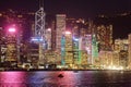 Night scenery of Hong Kong with a majestic skyline of crowded skyscrapers by Victoria Harbour Royalty Free Stock Photo