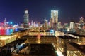 Night scenery of Hong Kong, viewed from Tsim Sha Tsui area in Kowloon, with city skyline of crowded skyscrapers Royalty Free Stock Photo