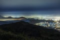 Night scenery of panorama of skyline of Hong Kong city in fog Royalty Free Stock Photo