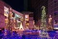 Night scenery of romantic Winter Illumination Display with decorated Christmas trees and dazzling lights