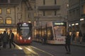 Night scenes from the center of Bern with people on the street, tourist sights and legendary trams or buses.