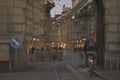 Night scenes from the center of Bern with people on the street, tourist sights and legendary trams or buses.