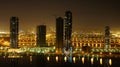 Night seen of Sharjah and Dubai cities on a lake