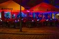 Night shot of a colorfully illuminated restaurant in downtown Berlin