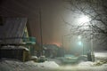 Night shot of country street under snow in winter season