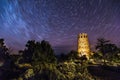 Night shot at the Grand Canyon, stars in the sky, watch tower in the foreground. Royalty Free Stock Photo