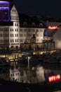 Night shot of a harbor on the Teltow Canal in Berlin-Tempelhof with boats, old warehouses, cranes and reflections on the water Royalty Free Stock Photo