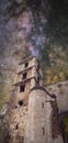 Night shot of a medieval, romanesque church under the Milky Way. Royalty Free Stock Photo