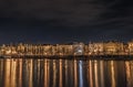 A night shot of Prague from Slavonic Island over Vltava and towards Smichov and JirÃÂ¡sek Bridge - Jiraskuv most