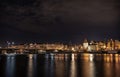 A night shot of Prague from Slavonic Island over Vltava and towards Smichov and JirÃÂ¡sek Bridge - Jiraskuv most
