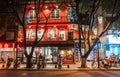 Night shot of red facade restaurant in street scene, Guilin, China