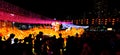 Night shot of scenic Mid-Autumn Festival with fire dragon and large crowd in Hong Kong