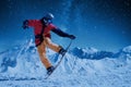 Night skating Snowboarder doing trick under the starry sky and moonlight