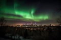 a night sky, with aurora dancing above a city skyline