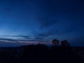 Night sky background, sunset wallpaper, nature photography, dark clouds in blue sky over the city Royalty Free Stock Photo