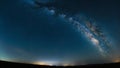 A stunning view of the night sky filled with countless stars, with the Milky Way shining brightly across the horizon. Royalty Free Stock Photo