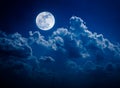 Night sky with bright full moon and cloudy, serenity nature back Royalty Free Stock Photo