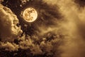 Night sky with bright full moon and cloudy, serenity nature background Royalty Free Stock Photo