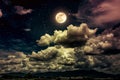 Night sky with bright full moon and dark cloud, serenity nature Royalty Free Stock Photo