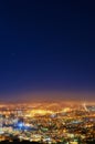 Night, sky and city with lights, buildings and Cape Town with view, traffic and urban development. Future, cloud and Royalty Free Stock Photo