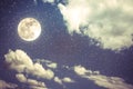 Night sky with full moon and cloudy, serenity nature background. Royalty Free Stock Photo