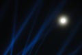 Night Sky Lit by the Moon and Beams of Llight Royalty Free Stock Photo