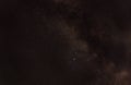 Night sky with many stars in area near constellations Sagitta, Vulpecula and Delphinus. Brightest star is Altair, and