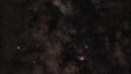 Night sky with milky way near Sagittarius constellation, bright Kaus Borealis star and M22 globular cluster left side Royalty Free Stock Photo