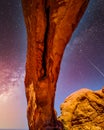 The night sky and milky way over the delicate Sandstone Arch of the North Window Arch in Arches National Park Utah, United States