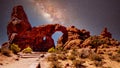 The night sky and milky way over the delicate Sandstone Arch of the Turret Arch in Arches National Park Utah, United States under