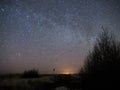 Night sky and milky way stars, Cassiopeia and andromeda constellation over sea Royalty Free Stock Photo