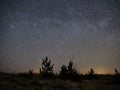 Night sky and milky way stars, Cassiopeia and andromeda constellation over sea Royalty Free Stock Photo