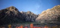 Night sky and milky way with stars over red rock canyon neveda