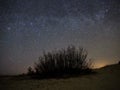 Night sky and milky way stars, Perseus constellation over sea