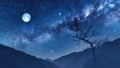 Night sky with moon and milky way over mountains