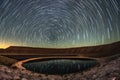 night sky over a meteor impact crater